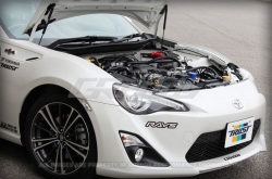 GReddy karbonové vzpěry kapoty - Toyota GT86 / Subaru BRZ